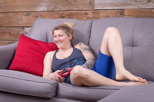 blond woman playing video games
