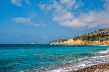 Beautiful small bay with crystal clear turquoise sea water on coast of Rhodes island, Greece.