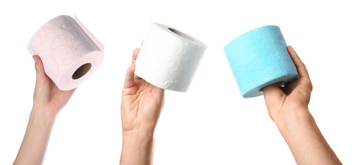 Women holding toilet paper rolls on white background, closeup
