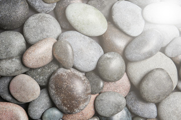 Fototapeta na wymiar Composition with spa stones as background, top view