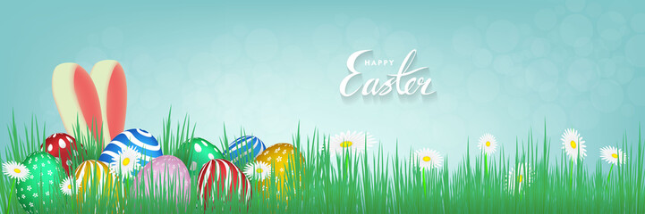 easter bunny ears and easter colored eggs with green grass and daisies vector background