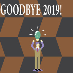 Writing note showing Goodbye 2019. Business concept for express good wishes when parting or at the end of last year Businessman Raising Arms Upward with Lighted Bulb icon above