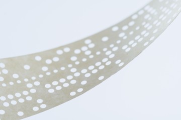 Obsolete data storage technology, old punched taper,  memory.