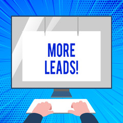 Handwriting text writing More Leads. Conceptual photo initiation of consumer interest or enquiry into product Hands on Mockup Keyboard Front of Blank White Monitor with Screen Protector