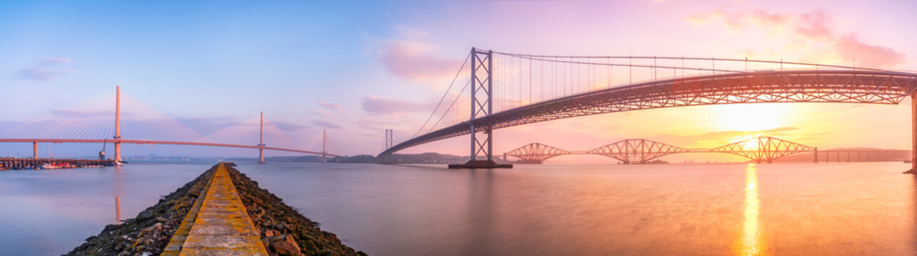 United Kingdom, Scotland, Firth of Forth, Forth Road and Rail Bridges and the new Queensferry Crossing Bridge at sunrise