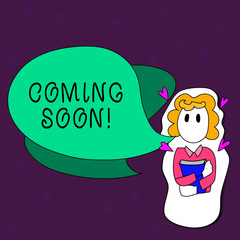 Text sign showing Coming Soon. Business photo text event or action that will happen after really short time Girl Holding Book with Small Hearts Around her and Two Color Speech Bubble