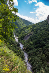 Fototapeta na wymiar Beautiful falls in mountains, the wild nature of the North Caucasus