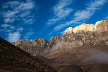 Mountains of the North Caucasus, mountain tops in clouds. Wild nature