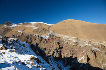 Mountains and the nature of the North Caucasus, the blue sky over high rocks in the beautiful gorge