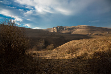 Mountains of the North Caucasus, mountain tops in clouds. Wild nature