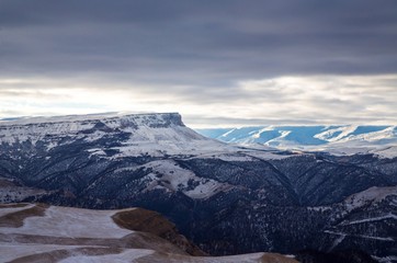 Mountains of the North Caucasus, mountain tops in clouds. Wild nature