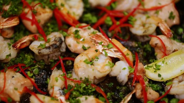 Shrimps with vegetables, bright dish close up