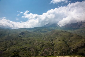Mountains of the North Caucasus, mountain tops in clouds. Wild nature