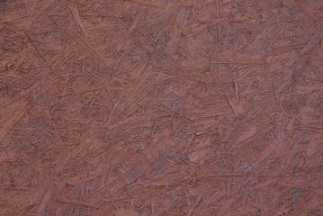 brown wooden texture of plywood sawdust board in the wall