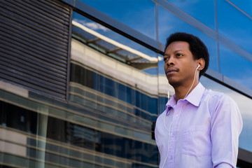 Portrait of an handsome businessman outdoor.