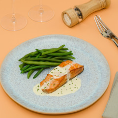 Grilled salmon steak. Salmon steak with fresh green beans