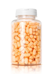 vitamin c tablets in transparent plastic bottle