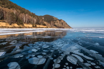 Bubbles of methane on the ice of Lake Baikal