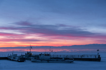 Fototapeta na wymiar Frozen ships in ice on Lake Baikal