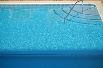 Fototapeta na wymiar close up on swimming pool with fresh blue water