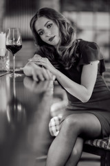 Girl with a glass of wine