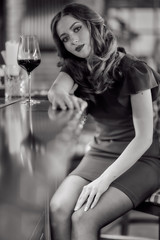 Girl with a glass of wine