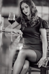 Girl with a glass of wine