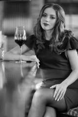 Girl with a glass of wine