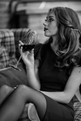 Girl with a glass of wine