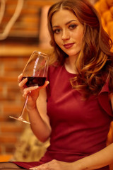 Girl with a glass of wine