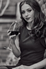 Girl with a glass of wine