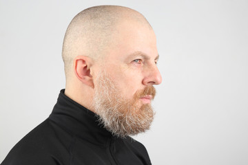 Fototapeta premium pensive bearded man in sports jacket