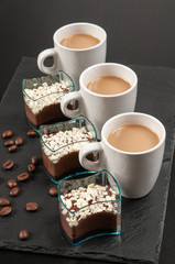 Mini dessert. Chocolatedessert and coffee with milk