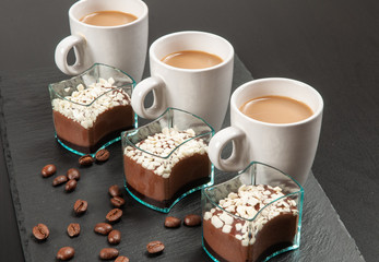 Mini dessert. Chocolatedessert and coffee with milk