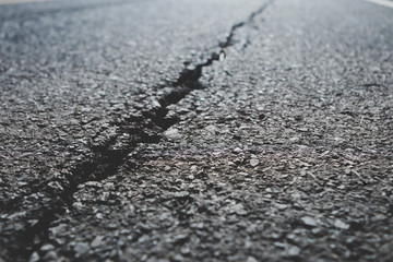 asphalt crack background.
