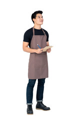 Handsome Asian man wearing apron as a barista