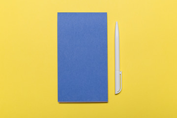 school notebook on a yellow background