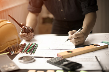 Concept Agreement between the employer and architect Nick and desk of Architectural project in...