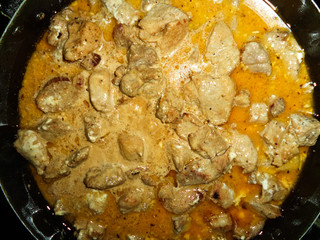 stew with sauce in a saucepan