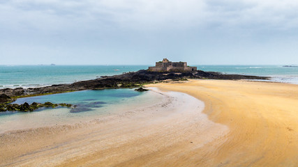 Saint Malo beach, Fort National during Low Tide. Brittany, France, Europe.