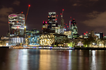 Skyline view of London business district, panoramic view at night. London, UK.