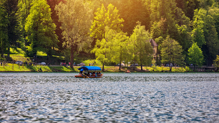 Iconic Bled scenery. Boats at lake Bled, Slovenia, Europe. Wooden boats on the Island on Lake Bled, Slovenia