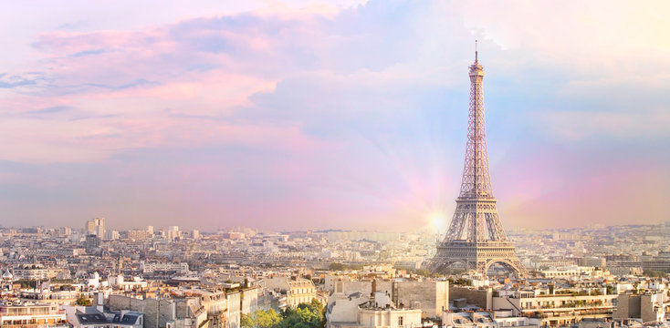 Sunset Eiffel tower and Paris city view form Triumph Arc. Eiffel Tower from Champ de Mars, Paris, France. Beautiful Romantic background.