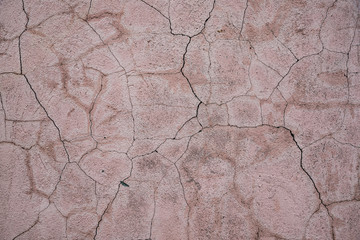A lot of cracks on the concrete wall texture
