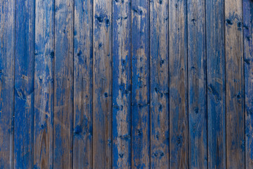 Wooden texture with old peeling paint blue