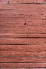 Obraz premium Wooden texture with old peeling paint red