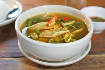 Kaeng Pa or Jungle curry is Hot&Spicy Thai curry with fish and spicy herb. Served with steamed rice, Selective focus. Still life shoot in studio, Clean food good taste idea concept.