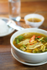 Kaeng Pa or Jungle curry is Hot&Spicy Thai curry with fish and spicy herb. Served with steamed rice, Selective focus. Still life shoot in studio, Clean food good taste idea concept.