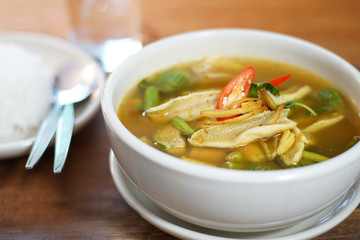 Thai tradition food: Kaeng Pa or Jungle curry is Hot&Spicy Thai curry with fish and spicy herb. Served with steamed rice, Selective focus. Still life shoot in studio, Clean food good taste concept.