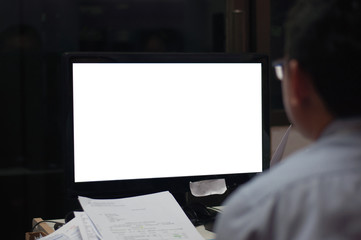 Man looking at monitor screen in office,select focus.